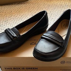 Navy blue Clark loafers.